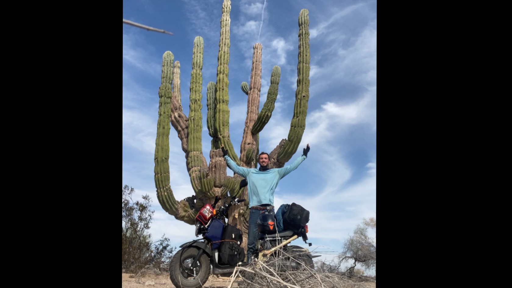 Jonathan Roberts with his loaded up Honda Ruckus in the desert of Baja California, Mexico 2