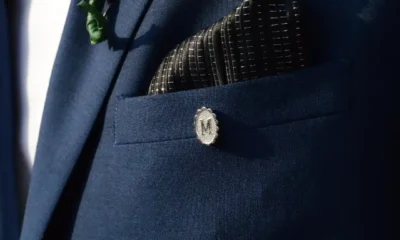 The History and Evolution of Suit Lapel Pins From Military Accoutrements to Fashion Accessories