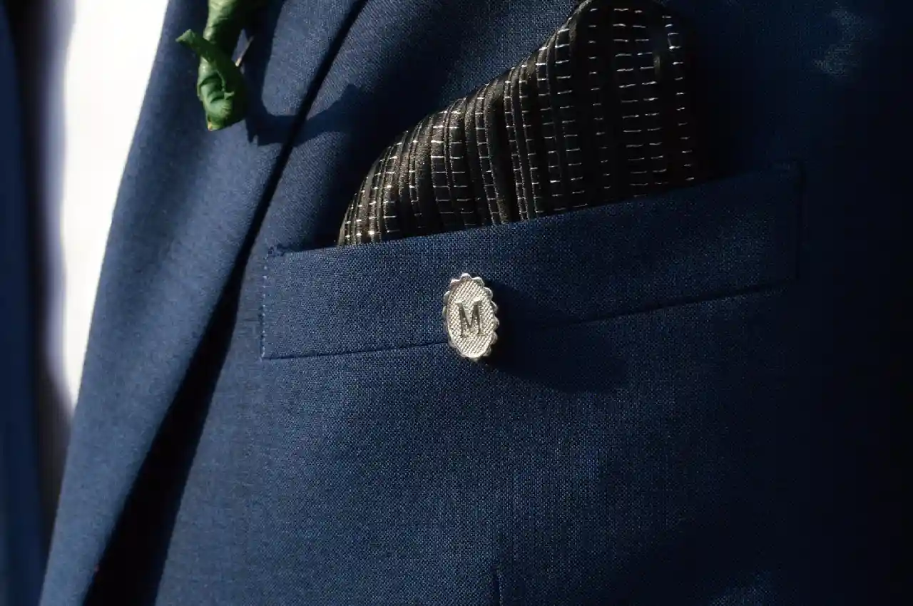 The History and Evolution of Suit Lapel Pins From Military Accoutrements to Fashion Accessories